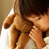 shame boy holding a teddy sad Why do I feel so ashamed of myself?